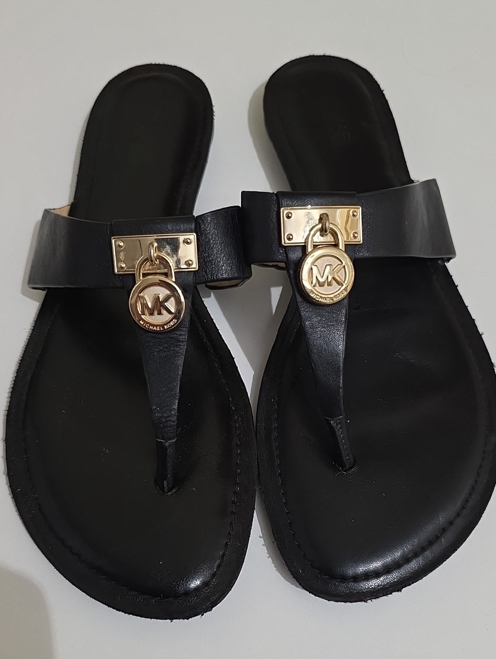 Michael Kors Black Leather Thong Sandals with Gold MK Charm